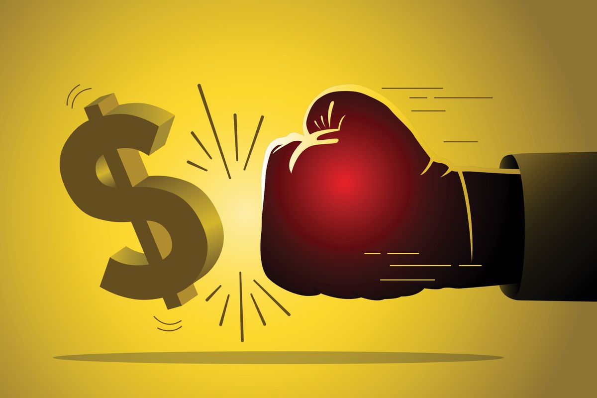 De-dollarization concept — boxing glove punching dollar sign.