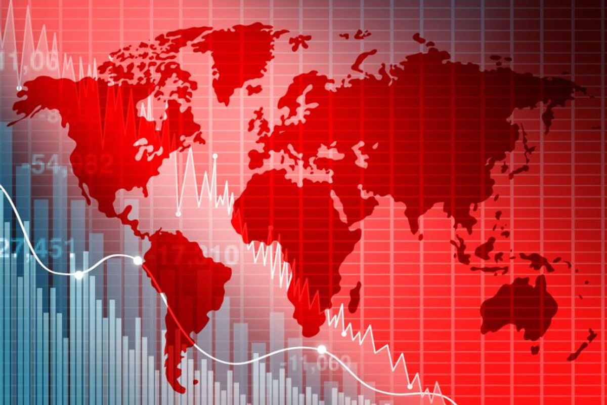 declining stock charts over world map