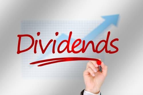 "dividends" written in red pen