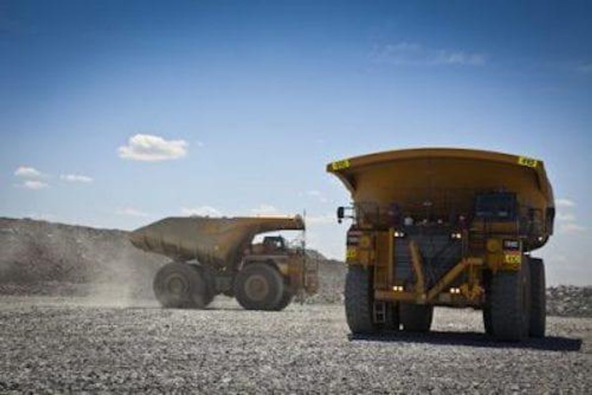 dump trucks at a mining site