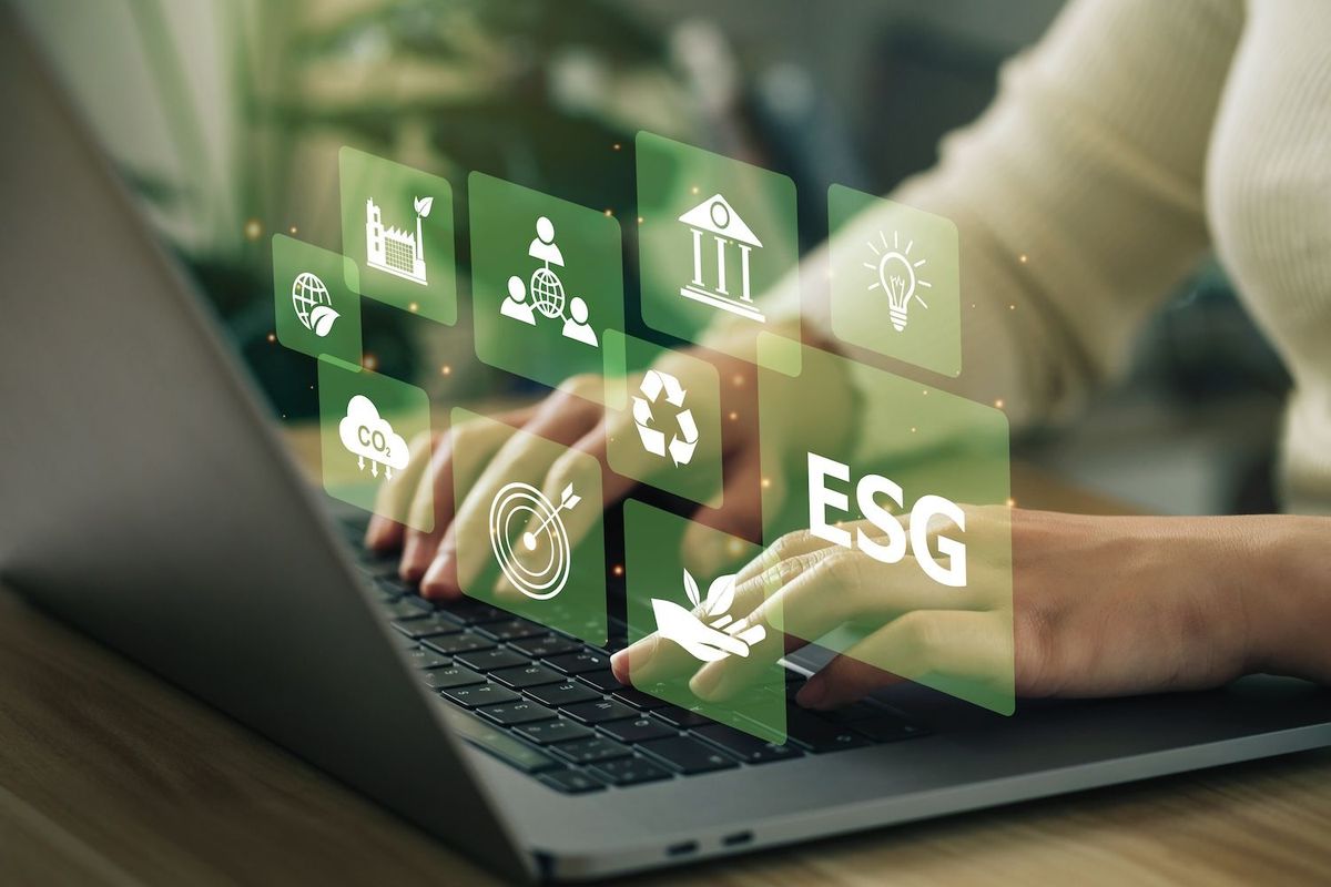 ESG symbols displayed above keyboard.