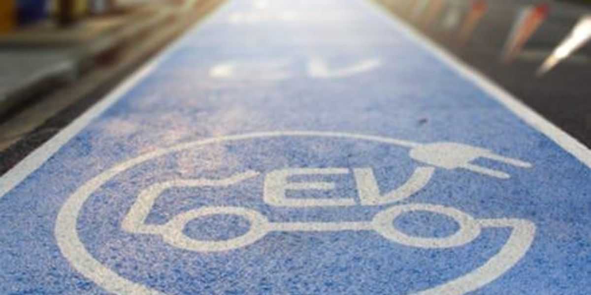 ev symbol painted on ground