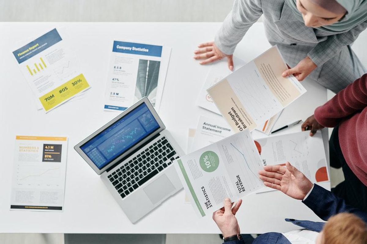 executives reviewing financial reports