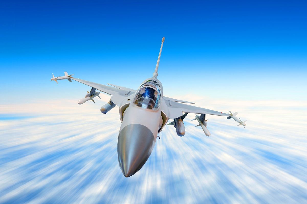 Fighter jet flying quickly.