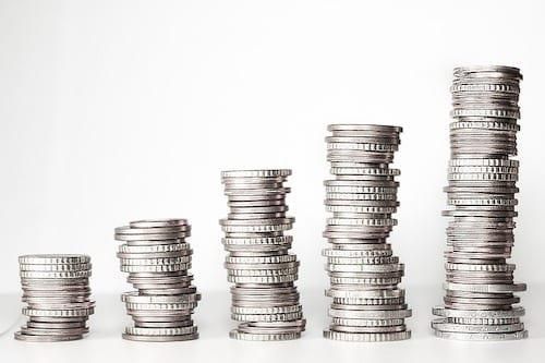 five stacks of silver coins
