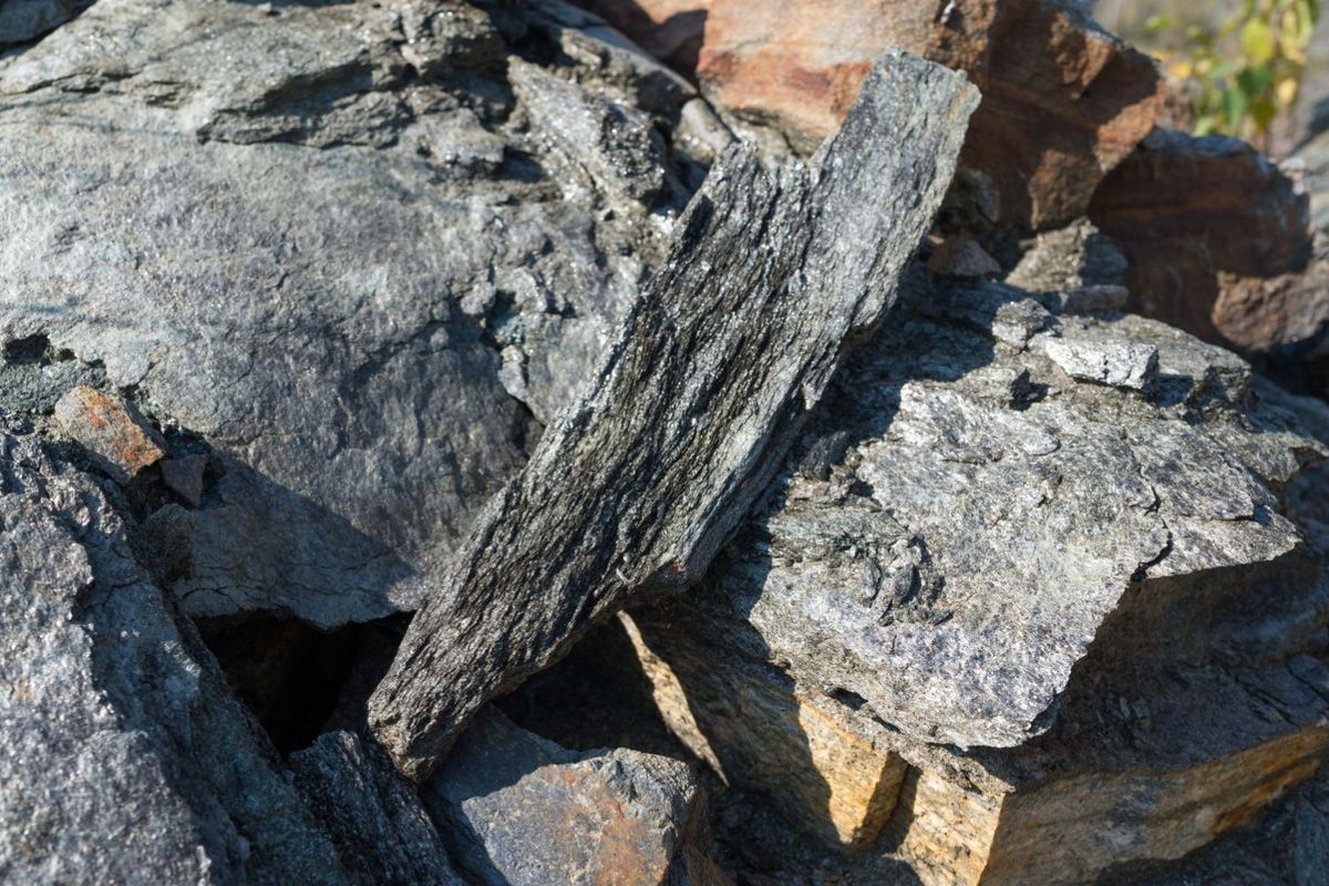 Flake graphite ore at graphite deposit.