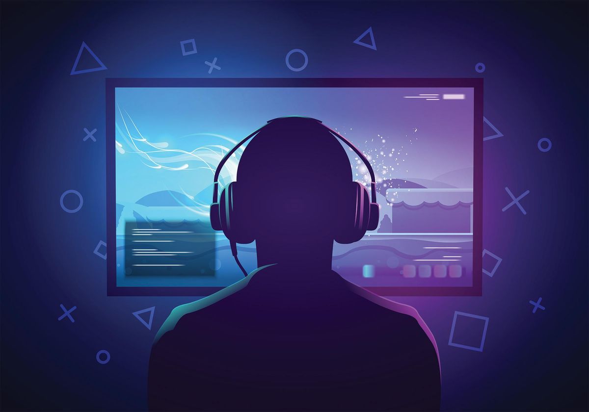 Gamer in front of computer screen.