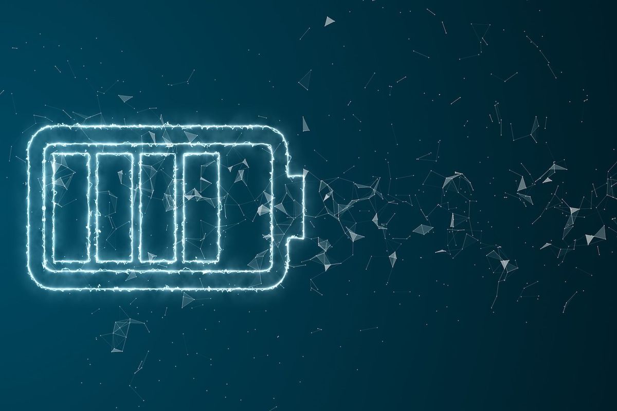 Glowing digital battery icon with particle connections on dark background.