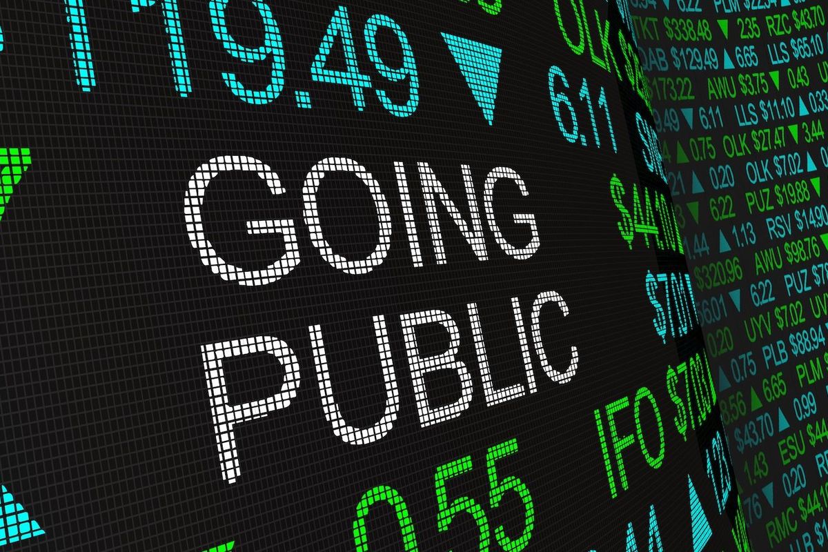 GOING PUBLIC written on ticker screen.