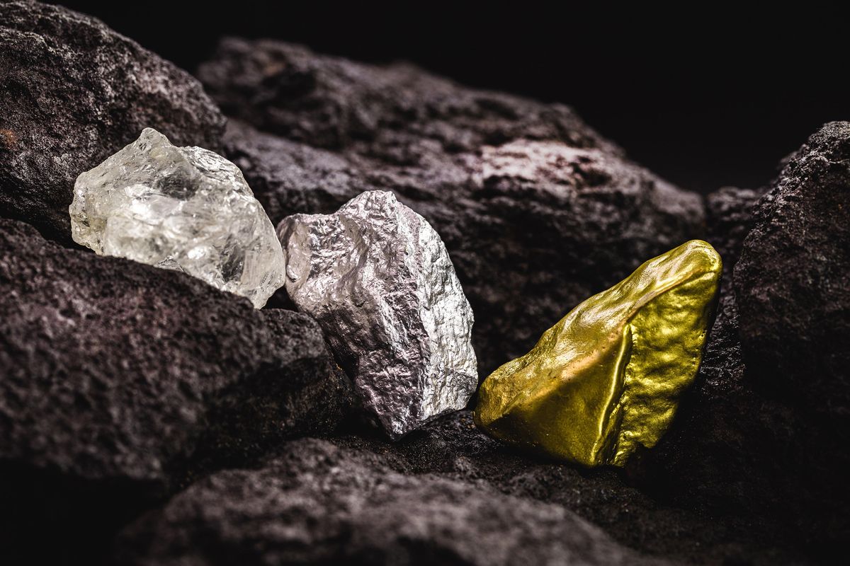 gold and silver nuggets and rough diamond in mine
