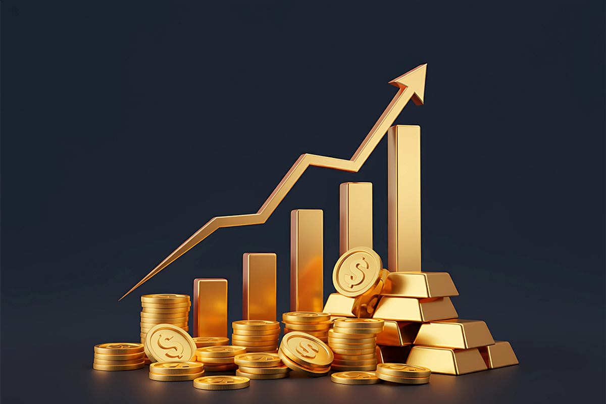 Gold bars and coins with an upward graph, symbolizing financial growth.