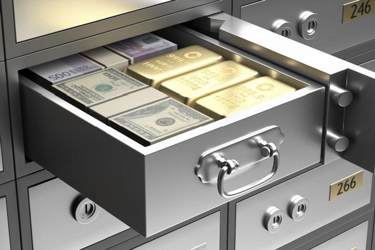gold bars and money in drawer