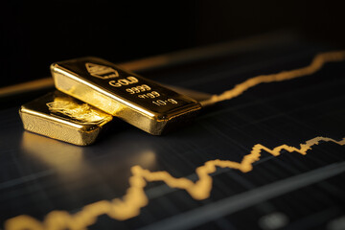 Gold bars on a fluctuating financial graph background.