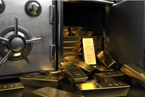 gold bars spilling out of a safe