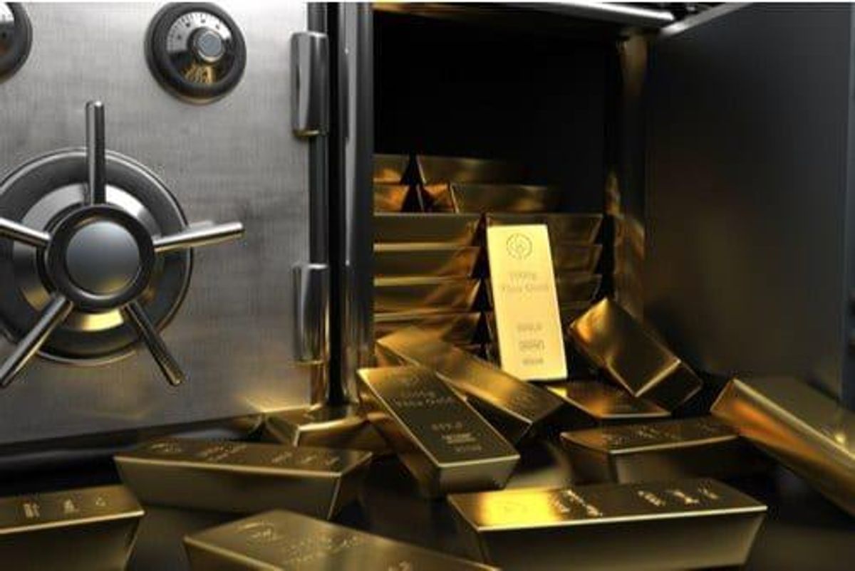 gold bars spilling out of a vault