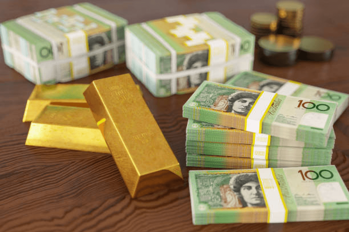Gold bars with Australian money.