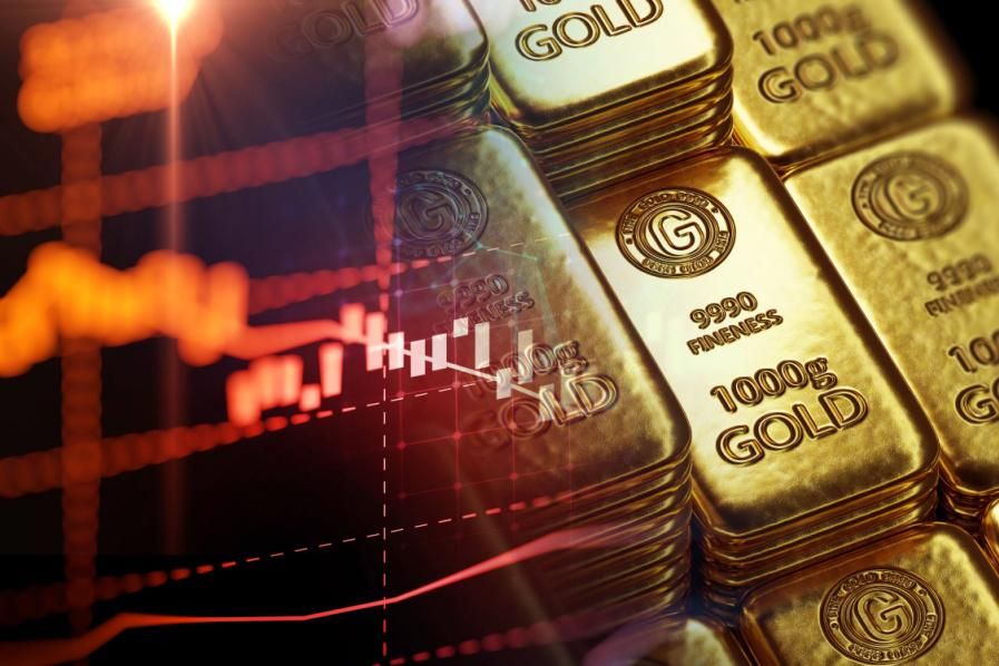 gold bars with red stock chart