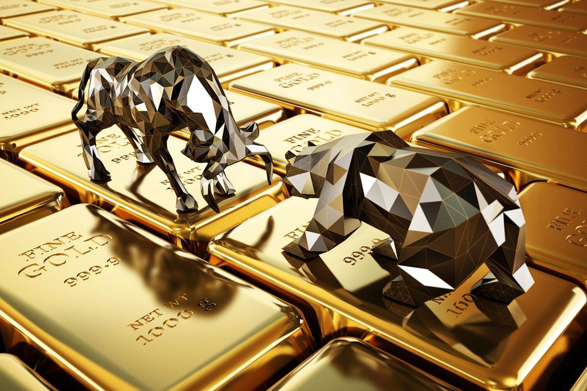 Gold bear and bull fighting over bars of gold.