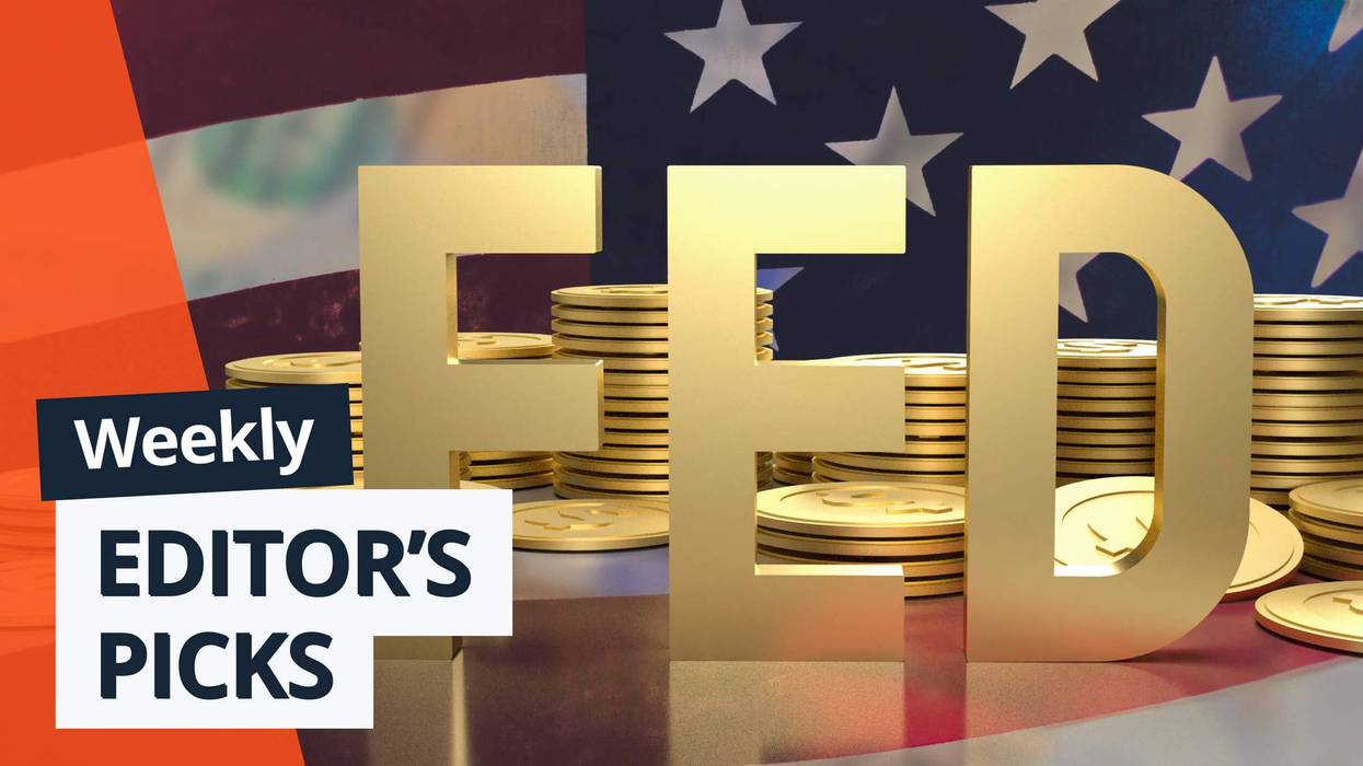 Gold coins and gold letters spelling "Fed" with US flag.