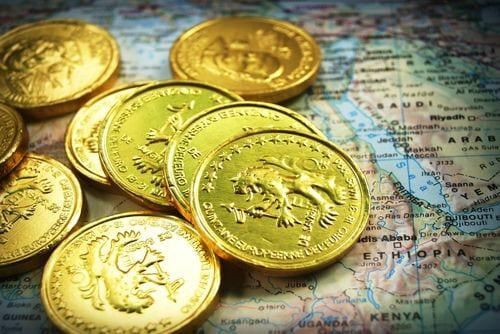 gold coins on a map