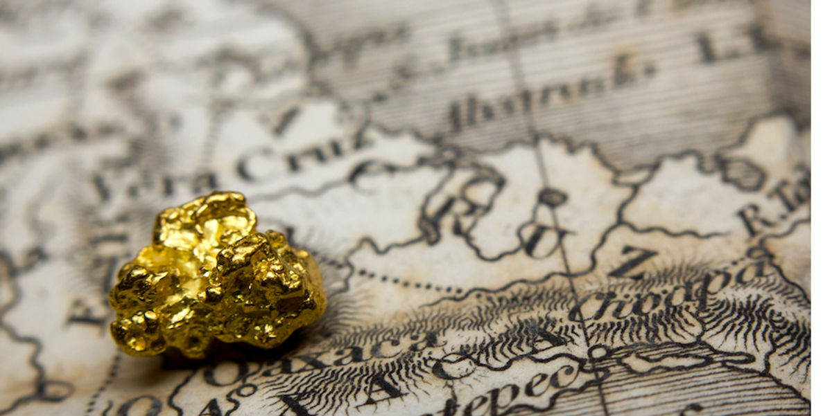 gold nugget on map of