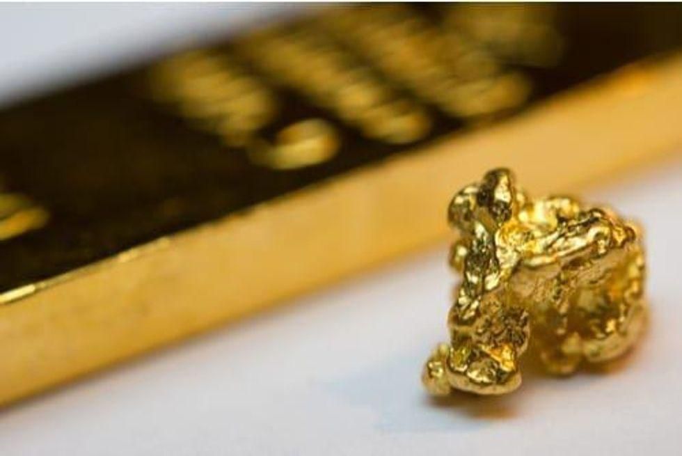 gold nugget with gold bar