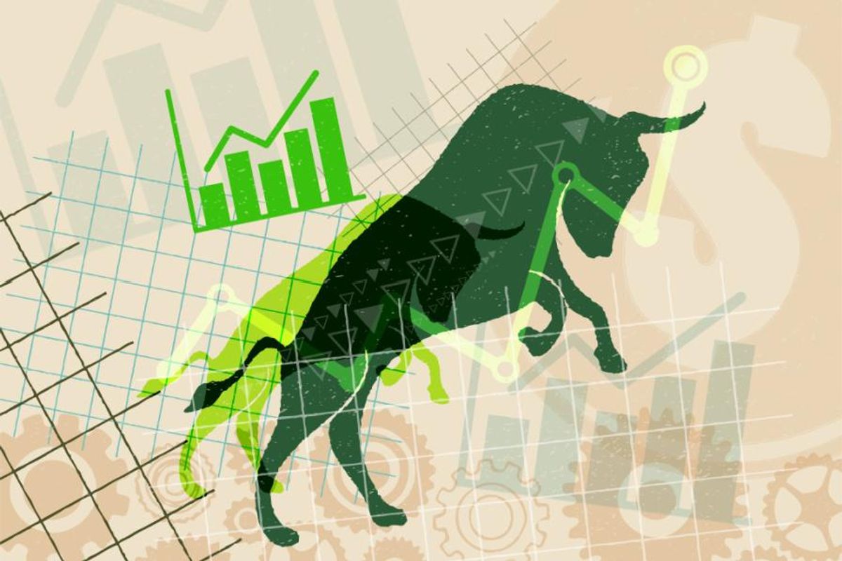 green bull with stock charts