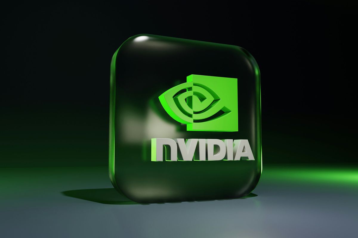 Green NVIDIA logo in a glossy 3D style on a dark background.