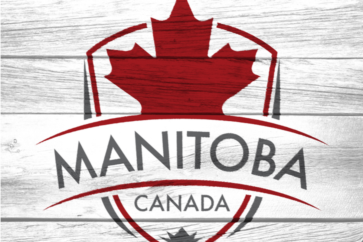 grey wood panels with a design that says "Manitoba, Canada" below a maple leaf