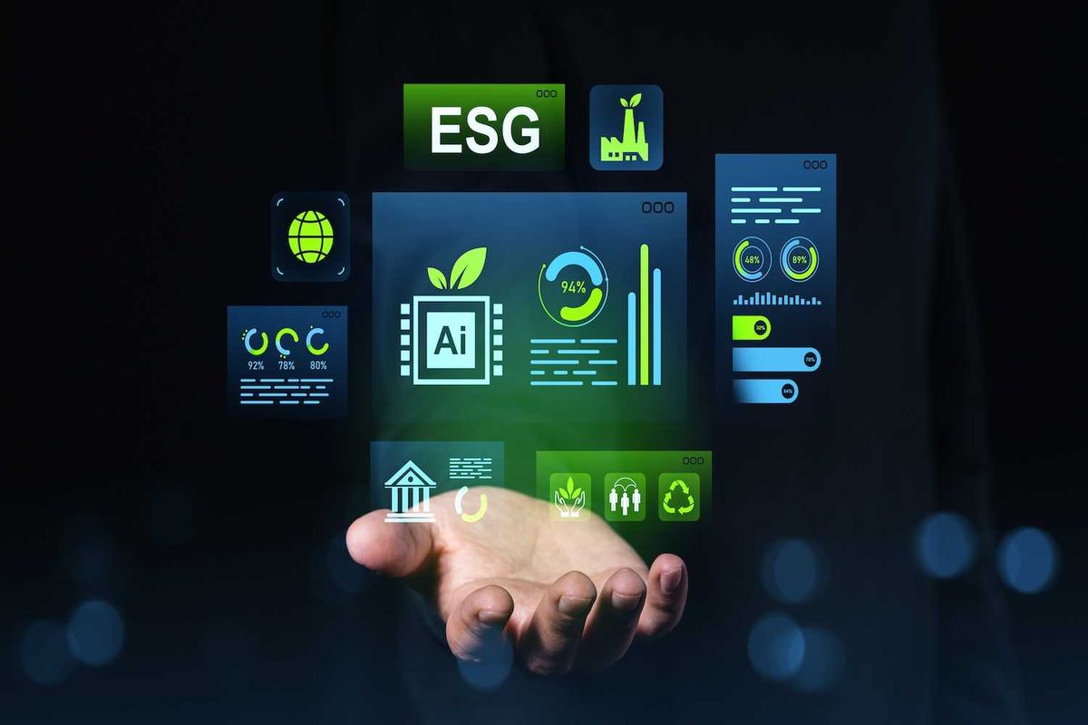 Hand holding digital ESG graphics with AI, charts, and sustainability icons.