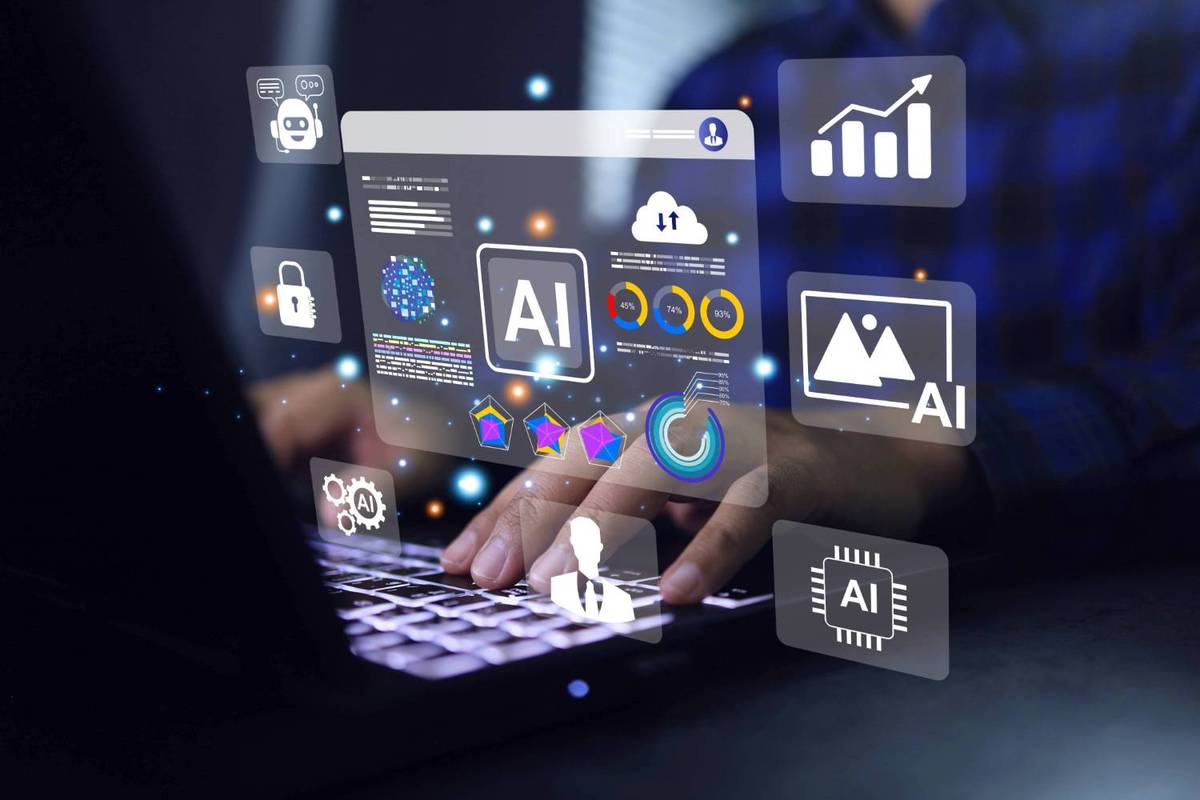 Hands typing on a laptop with glowing AI-related icons, charts and graphics floating onscreen.