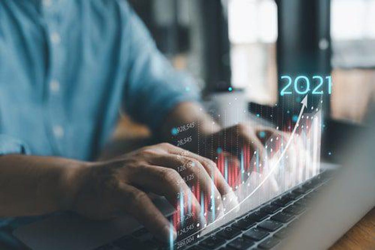 hands typing on keyboard