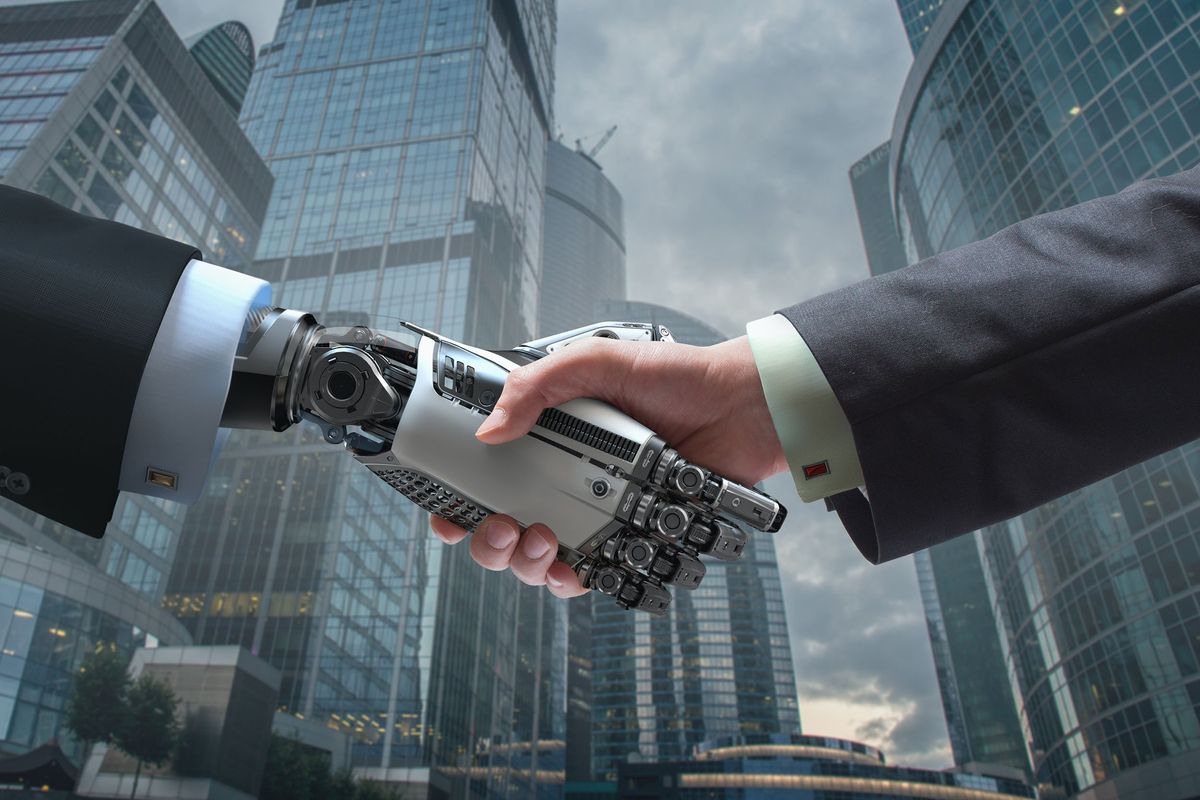 Handshake between robot and human.  