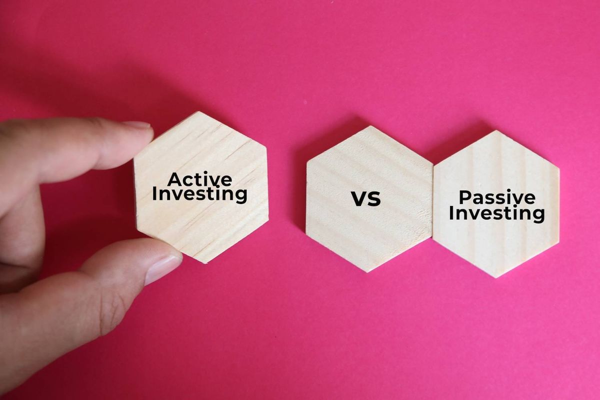 "Hexagons labeled 'Active Investing' vs 'Passive Investing' on a pink background."
