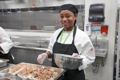 Culinary student making a dessert