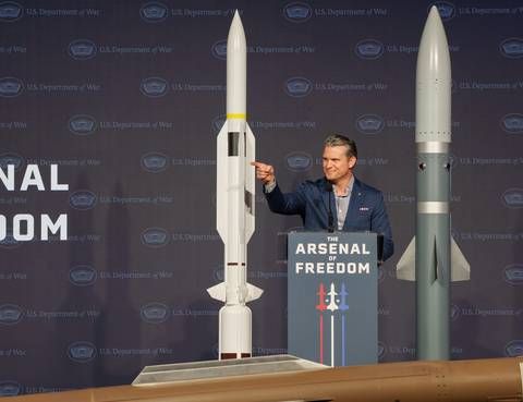 Secretary of War Pete Hegseth addresses a crowd of approximately 1,500 L3Harris employees in Camden, Arkansas, as part of his 