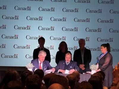 Frontier Lithium CEO Trevor Walker and the Honourable Tim Hodgson, Minister of Energy and Natural Resources, formalizing support under NRCAN's Global Partnerships Initiative, advancing innovation, sustainability, and value creation at the PAK Lithium Project. (CNW Group/Frontier Lithium Inc.)