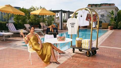 Laura Harrier poses with the American Express Gold 60th Collection With STAUD