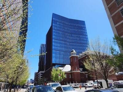Street‑level view of the MIT‑IBM Computing Research Lab in Cambridge, MA.