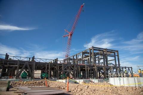 Ironworkers installing structural steel on the second level of the Filter Building.