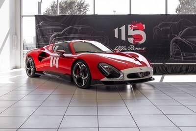 The Alfa Romeo 33 Stradale, presented to its first American owner at Alfa Romeo of Austin in Texas, features bespoke Rosso Villa d'Este paint with a white front stripe and the number 14, a tribute to Enzo Ferrari and A.J. Foyt