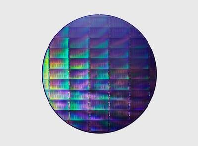 A 300-millimeter quantum wafer. (Credit: IBM)