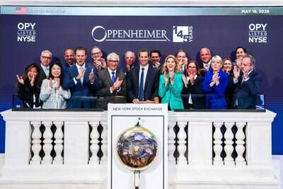 Oppenheimer Rang Closing Bell at NYSE on May 18