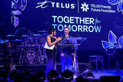 TELUS Friendly Future Foundation youth beneficiary, Mitchell Stade, shares his inspiring story during the Together for Tomorrow Gala, with Nimmi Kanji, Executive Director, TELUS Friendly Future Foundation. (Photo courtesy of George Pimentel Photography) (CNW Group/TELUS Communications Inc.)