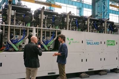 GeoPura CEO Andrew Cunningham (left) and CTO Theo Elmer (right) in front of an HPU-2 500kW system containing Ballard Fuel Cell Engines. (CNW Group/Ballard Power Systems Inc.) GeoPura CEO Andrew Cunningham (left) and CTO Theo Elmer (right) in front of an HPU-2 500kW system containing Ballard Fuel Cell Engines. (CNW Group/Ballard Power Systems Inc.)