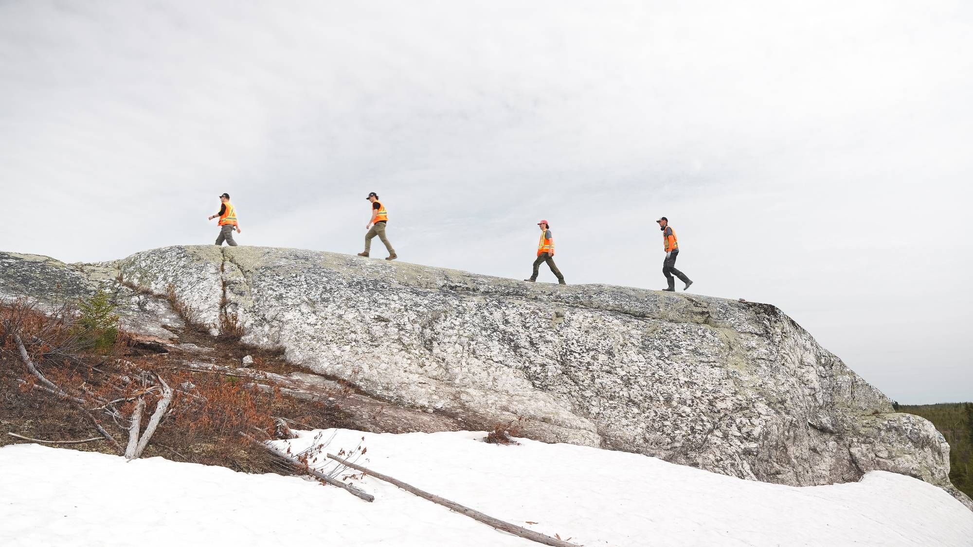 Geologists Walking Across the CO1 Outcrop at the Cisco Lithium Project