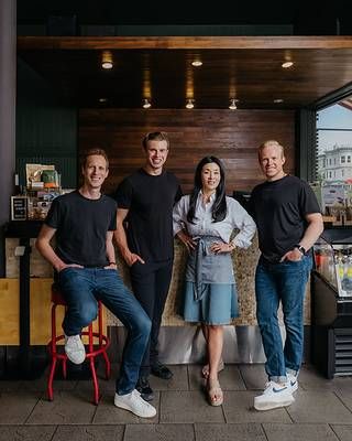 Left to right: Rob Lehman (President & COO), Adam Guild (Co-founder & CEO), Ashley Lee (Owner of Ashley's Cafe), Dean Bloembergen (Co-founder & CTO)