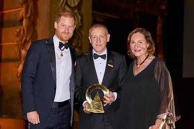 Nick Booth, CEO of Canada's True Patriot Love Foundation, receives the Invictus Legacy Award for helping to bring the Invictus Games to Canada, presented by Prince Harry, Duke of Sussex and Nancy Southern, ATCO Chair & CEO