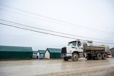 ATCO truck carries potable water for use in the 350-person Operation Nanook camp. 