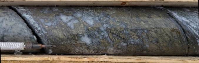 Chalcopyrite-pyrite quartz veining from AZ26-008 at 633.3 metres, assaying 1.85% copper, 1.97 g/t gold, 110 ppm molybdenum.